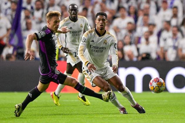 2024-05-08 Real Madrid v FC Bayern Munchen - Semi-final Second Leg - UEFA Champions League 2023 24 MADRID, SPAIN - MAY 8: Joshua Kimmich of FC Bayern Munchen battles for the ball with Jude Bellingham of Real Madrid during the Semi-final Second Leg - UEFA Champions League 2023 24 match between Real Madrid and FC Bayern Munchen at Estadio Santiago Bernabeu on May 8, 2024 in Madrid, Spain. (Photo by Pablo Morano BSR Agency) Madrid Spain Content not available for redistribution in The Netherlands directly or indirectly through any third parties. Copyright: xBSRxAgencyx