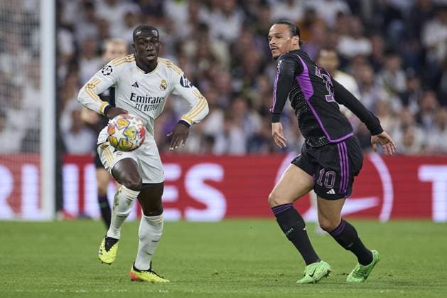 Ferland Mendy of Real Madrid CF compete for the ball with Leroy Sane of FC Bayern Munich with the ball during the UEFA Champions League match between Real Madrid and Bayern Munich at Santiago Bernabeu Stadium on May 8, 2024 in Madrid, Spain. (Photo by: LGM) FOOTBALL : Real Madrid vs Bayern Munich- UEFA Champions League - 08 05 2024 LGM Panoramic 