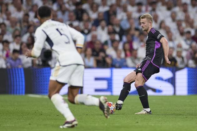 Matthijs de Ligt of FC Bayern Munich with the ball during the UEFA Champions League match between Real Madrid and Bayern Munich at Santiago Bernabeu Stadium on May 8, 2024 in Madrid, Spain. (Photo by: LGM) FOOTBALL : Real Madrid vs Bayern Munich- UEFA Champions League - 08 05 2024 LGM Panoramic 