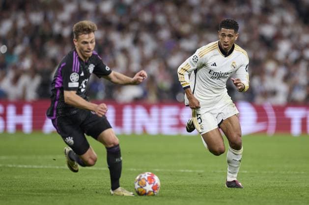 Jude Bellingham of Real Madrid CF and Joshua Kimmich of FC Bayern Munich during the UEFA Champions League match between Real Madrid and Bayern Munich at Santiago Bernabeu Stadium on May 8, 2024 in Madrid, Spain. (Photo by: LGM) FOOTBALL : Real Madrid vs Bayern Munich- UEFA Champions League - 08 05 2024 LGM Panoramic 