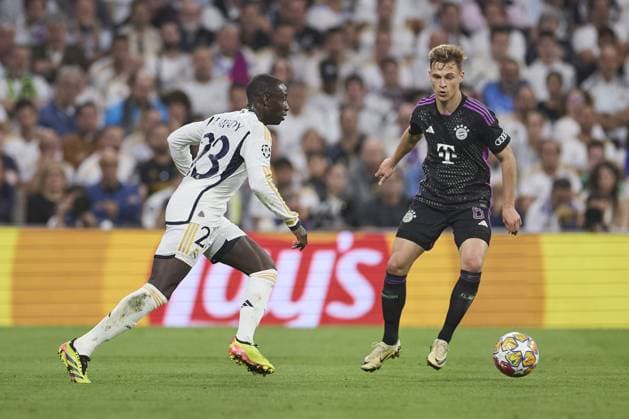 Ferland Mendy of Real Madrid CF compete for the ball with Joshua Kimmich of FC Bayern Munich during the UEFA Champions League match between Real Madrid and Bayern Munich at Santiago Bernabeu Stadium on May 8, 2024 in Madrid, Spain. (Photo by: LGM) FOOTBALL : Real Madrid vs Bayern Munich- UEFA Champions League - 08 05 2024 LGM Panoramic 