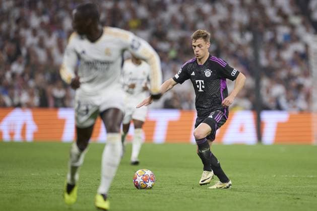 Joshua Kimmich of FC Bayern Munich with the ball during the UEFA Champions League match between Real Madrid and Bayern Munich at Santiago Bernabeu Stadium on May 8, 2024 in Madrid, Spain. (Photo by: LGM) FOOTBALL : Real Madrid vs Bayern Munich- UEFA Champions League - 08 05 2024 LGM Panoramic 