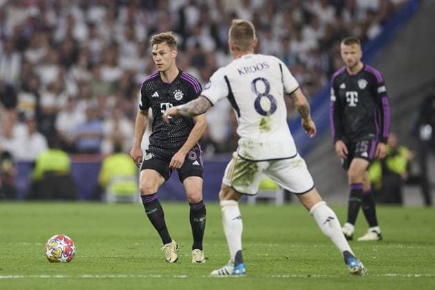 Joshua Kimmich of FC Bayern Munich with the ball during the UEFA Champions League match between Real Madrid and Bayern Munich at Santiago Bernabeu Stadium on May 8, 2024 in Madrid, Spain. (Photo by: LGM) FOOTBALL : Real Madrid vs Bayern Munich- UEFA Champions League - 08 05 2024 LGM Panoramic 