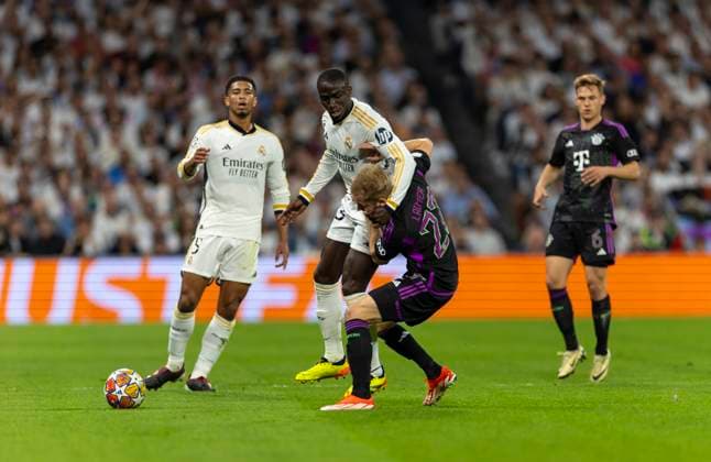 08 05 2024, Football UEFA Champions League 2023 2024 semi-final, Real Madrid FC Bayern Munich, at Estadio Santiago Bernabeu, Madrid, Ferland Mendy Real Madrid vs Konrad Laimer FC Bayern Munich