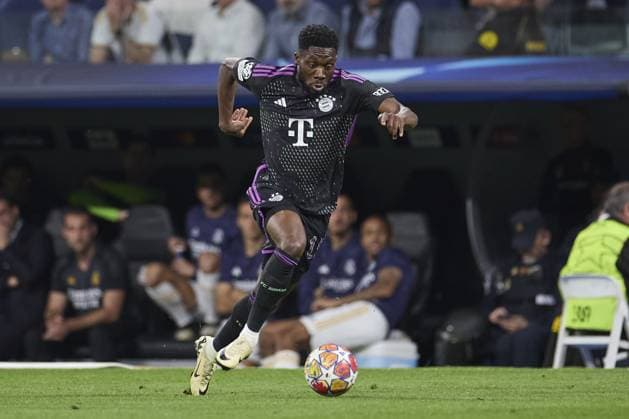 Alphonso Davies of FC Bayern Munich with the ball during the UEFA Champions League match between Real Madrid and Bayern Munich at Santiago Bernabeu Stadium on May 8, 2024 in Madrid, Spain. (Photo by: LGM) FOOTBALL : Real Madrid vs Bayern Munich- UEFA Champions League - 08 05 2024 LGM Panoramic 
