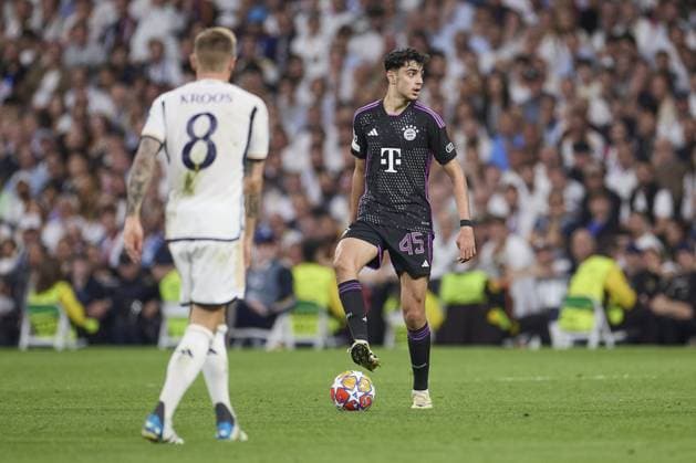 Aleksandar Pavlovic of FC Bayern Munich with the ball during the UEFA Champions League match between Real Madrid and Bayern Munich at Santiago Bernabeu Stadium on May 8, 2024 in Madrid, Spain. (Photo by: LGM) FOOTBALL : Real Madrid vs Bayern Munich- UEFA Champions League - 08 05 2024 LGM Panoramic 