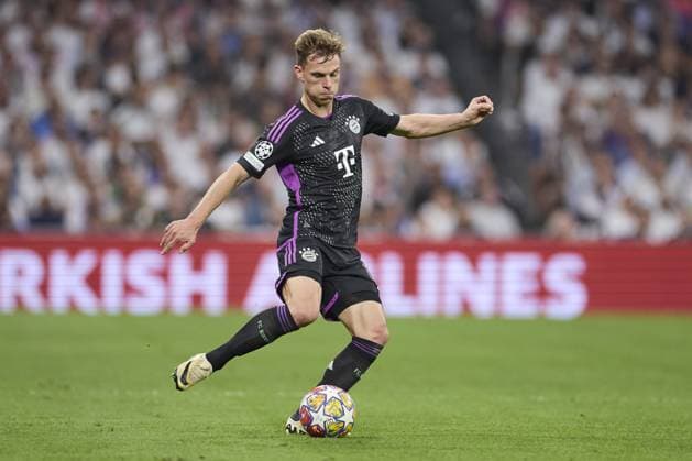 Joshua Kimmich of FC Bayern Munich with the ball during the UEFA Champions League match between Real Madrid and Bayern Munich at Santiago Bernabeu Stadium on May 8, 2024 in Madrid, Spain. (Photo by: LGM) FOOTBALL : Real Madrid vs Bayern Munich- UEFA Champions League - 08 05 2024 LGM Panoramic 