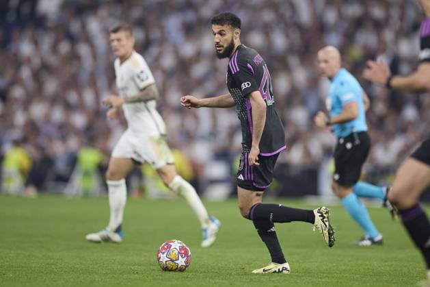 Noussair Mazraoui of FC Bayern Munich with the ball during the UEFA Champions League match between Real Madrid and Bayern Munich at Santiago Bernabeu Stadium on May 8, 2024 in Madrid, Spain. (Photo by: LGM) FOOTBALL : Real Madrid vs Bayern Munich- UEFA Champions League - 08 05 2024 LGM Panoramic 