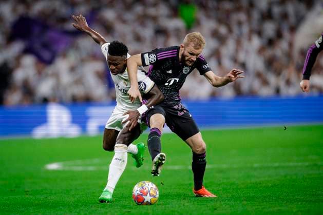 Konrad Laimer 27 FC Bayern Muenchen in duel, action, with Vinicius Junior 7 Madrid , Real Madrid vs FC Bayern Muenchen, football, Champions League, semi-final, 08 05 2024 Madrid Madrid Spain Copyright: xkolbert-press MarcxNiemeyerx