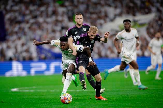 Konrad Laimer 27 FC Bayern Muenchen in duel, action, with Vinicius Junior 7 Madrid , Real Madrid vs FC Bayern Muenchen, football, Champions League, semi-final, 08 05 2024 Madrid Madrid Spain Copyright: xkolbert-press MarcxNiemeyerx