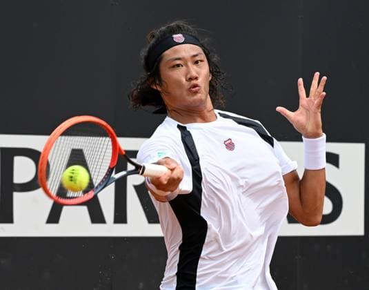 (240509) -- ROME, May 9, 2024 -- Zhang Zhizhen of China competes during the men s singles 1st round match against Daniel Elahi Galan of Colombia at the Men s ATP, Tennis Herren Rome Open tennis tournament in Rome, Italy, May 8, 2024. (Photo by Xinhua) (SP)ITALY-ROME-TENNIS-ATP-ROME OPEN AlbertoxLingria 