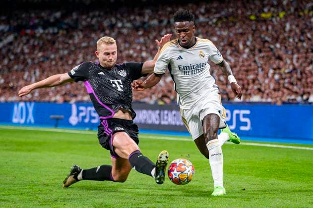Real Madrid vs FC Bayern Munchen: Semi-final Second Leg - UEFA Champions League 2023 24 MADRID, SPAIN - MAY 8: Vinicius Junior of Real Madrid (R) seen in action against Eric Dier of FC Bayern Munchen (L) during the UEFA Champions League semi-final second leg match between Real Madrid and FC Bayern Munchen at Estadio Santiago Bernabeu on May 8, 2024 in Madrid, Spain. Madrid Estadio Santiago Bernabeu Spain Copyright: xAlbertoxGardinx AGardin_20240508_Football_Champions_Real_Madrid_vs_Bayern_072