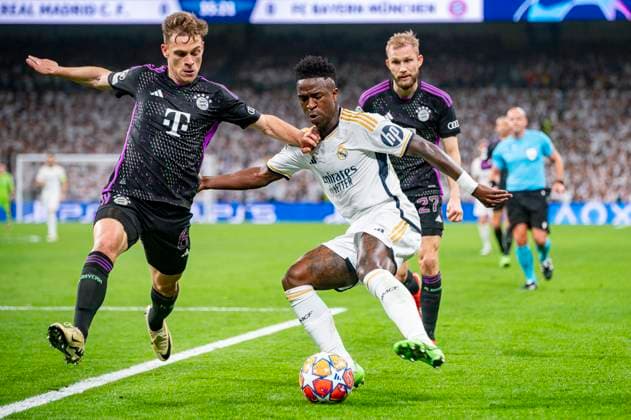 Real Madrid vs FC Bayern Munchen: Semi-final Second Leg - UEFA Champions League 2023 24 MADRID, SPAIN - MAY 8: Vinicius Junior of Real Madrid (R) seen in action against Joshua Kimmich of FC Bayern Munchen (L) during the UEFA Champions League semi-final second leg match between Real Madrid and FC Bayern Munchen at Estadio Santiago Bernabeu on May 8, 2024 in Madrid, Spain. Madrid Estadio Santiago Bernabeu Spain Copyright: xAlbertoxGardinx AGardin_20240508_Football_Champions_Real_Madrid_vs_Bayern_082