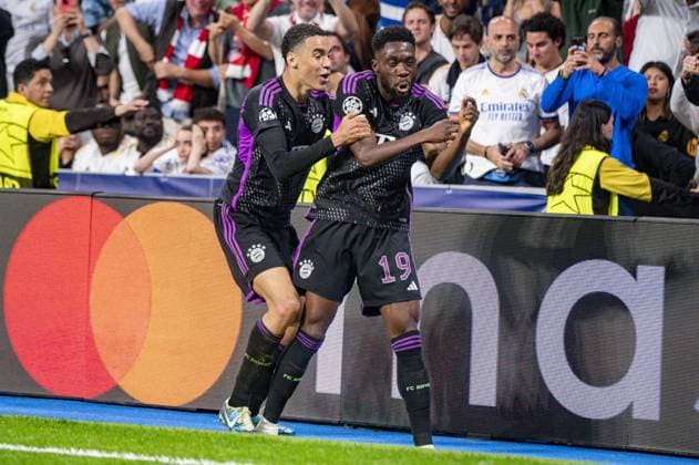 UEFA Champions League football match - Real Madrid vs Bayern Munich MADRID, SPAIN - MAY 8: Alphonso Davies of FC Bayern Munchen (R) seen celebrating his goal with Jamal Musitala of FC Bayern Munchen (L) during the UEFA Champions League semi-final second leg match between Real Madrid and FC Bayern Munchen at Estadio Santiago Bernabeu on May 8, 2024 in Madrid, Spain. Madrid Spain  Copyright: xIPAxSport ABACAx