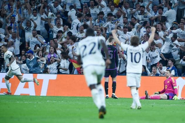 (240509) -- MADRID, May 9, 2024 -- Joselu (1st L) of Real Madrid celebrates his goal during the UEFA Champions League semifinal second leg match between Real Madrid and Bayern Munich at Santiago Bernabeu stadium, in Madrid, Spain, on May 8, 2024. (Photo by Xinhua) (SP)SPAIN-MADRID-FOOTBALL-UEFA CHAMPIONS LEAGUE-BAYERN MUNICH VS REAL MADRID GustavoxValiente 