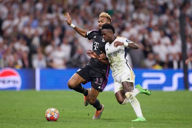 May 8, 2024, Madrid, Spain: Eric Maxim Choupo-Moting (L) of FC Bayern Munchen and Vinicius Junior (R) of Real Madrid CF in action during the 2023 2024 UEFA Champions League semi-final second leg football match between Real Madrid CF and FC Bayern Munchen at Santiago Bernabeu stadium. Final score: Real Madrid CF 2:1 FC Bayern Munchen Madrid Spain - ZUMAs197 20240508_aaa_s197_440 Copyright: xFedericoxTitonex