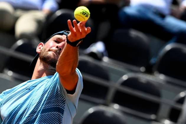 Andrea Vavassori of Italy serves during the match against Dominik Koepfer of Germany at the Internazionali BNL d Italia 2024 tennis tournament at Foro Italico in Rome, Italy on May 9, 2024. antoniettaxbaldassarre
