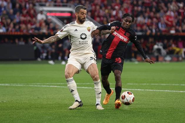 Jeremie Frimpong of Bayer Leverkusen shoots at goal Bayer 04 Leverkusen v Roma, UEFA Europa League, Semi Final, Second Leg Football, BayArena, Leverkusen, Germany - 09 May 2024 EDITORIAL USE ONLY No use with unauthorised audio, video, data, fixture lists, club league logos or live services. Online in-match use limited to 120 images, no video emulation. No use in betting, games or single club league player publications. Copyright: xPaulxCurrie Shutterstockx 14470736v