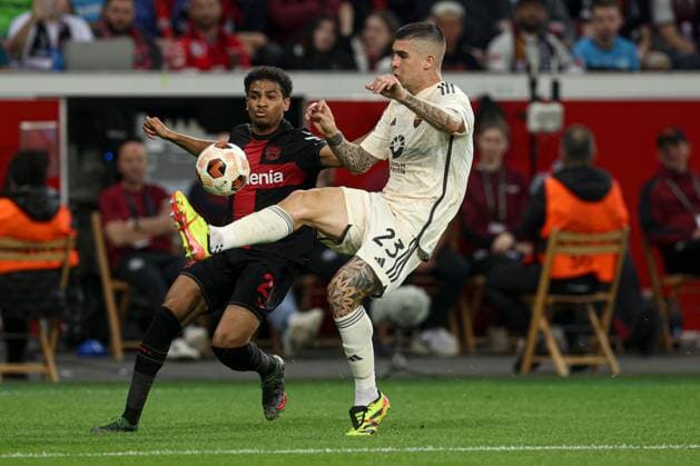 Amine Adli of Bayer Leverkusen and Gianluca Mancini of Roma Bayer 04 Leverkusen v Roma, UEFA Europa League, Semi Final, Second Leg Football, BayArena, Leverkusen, Germany - 09 May 2024 EDITORIAL USE ONLY No use with unauthorised audio, video, data, fixture lists, club league logos or live services. Online in-match use limited to 120 images, no video emulation. No use in betting, games or single club league player publications.  Copyright: xPaulxCurrie Shutterstockx 14470736an