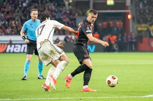 Football UEFA Europa League, season 2023 2024, semi-final, second leg, Bayer 04 Leverkusen AS Roma on 09 05 2024 at BayArena in Leverkusen duel between Sardar Azmoun AS Roma, 17 and Granit Xhaka Bayer 04 Leverkusen, 34 Photo Kirchner Media TH Copyright: xKirchner-Media THx