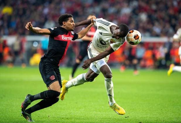 Football, Men, 2023 2024 season, Europa League semi-final, second leg , Bayer 04 Leverkusen AS Roma, v l Amine Adli Bayer 04 Leverkusen , Evan N Dicka AS Roma , 09 05 2024, Copyright: xSebastianxRäppold MatthiasxKochx