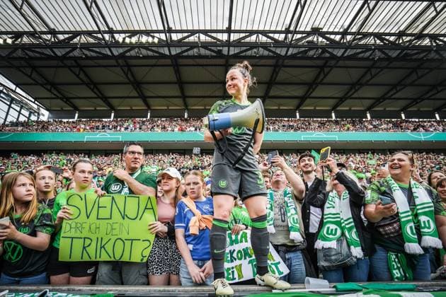 Soccer DFB Cup Women 2023 2024 Final Rhein Energie Stadion Cologne FC Bayern Munich vs VfL Wolfsburg Wolfsburgs Marina Hegering with microphone on the fan stand of the Wolfsburg fans Cologne Rhein Energie Stadion North Rhine-Westphalia Germany Copyright: xJoeranxSteinsiekx