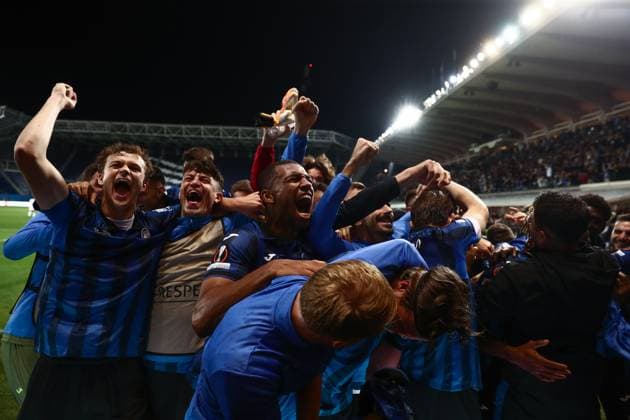 Bergamo, Italy, 9th May 2024. Atalanta BC players celebrate after mate El Bilal Toure scored to give the side a 3-0 lead during the UEFA Europa League match at Gewiss Stadium, Bergamo. Picture credit should read: Jonathan Moscrop Sportimage EDITORIAL USE ONLY. No use with unauthorised audio, video, data, fixture lists, club league logos or live services. Online in-match use limited to 120 images, no video emulation. No use in betting, games or single club league player publications. SPI-3122-0003