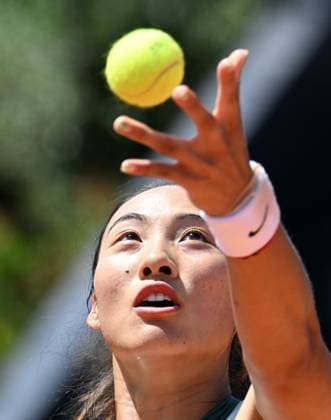 (240510) -- ROME, May 10, 2024 -- Zheng Qinwen of China serves during the women s singles round of 64 match against Shelby Rogers of the United States at the WTA, Tennis Damen Italian Open in Rome, Italy, May 9, 2024. (Photo by Xinhua) (SP)ITALY-ROME-TENNIS-WTA-ROME OPEN AlbertoxLingria 
