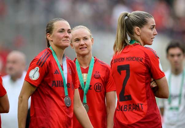 v l Magdalena ERIKSSON M , Pernille HARDER M , Linda SEMBRANT M disappointed after the match, with medals, DFB Pokal Final Women 2024, FC Bayern Muenchen M VfL Wolfsburg WOB 0 2, on 09 05 2024 in Cologne Germany DFB regulations prohibit any use of photographs as image sequences and or quasi video Â