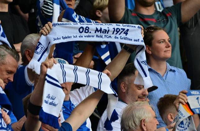 10 05 2024 Soccer Season 2023 2024 2 Soccer Bundesliga 33 Matchday 1 FC Magdeburg FCM SpVgg Greuther Fürth Kleeblatt Sportfoto Zink MeZi xmexzix DFL regulations prohibit any use of photographs as image sequences and or quasi video only for editorial use Feature Impression Symbolbild Symbolfoto Jubiläum Magdeburg Europapokal Europapokalsieger Fans Fanblock
