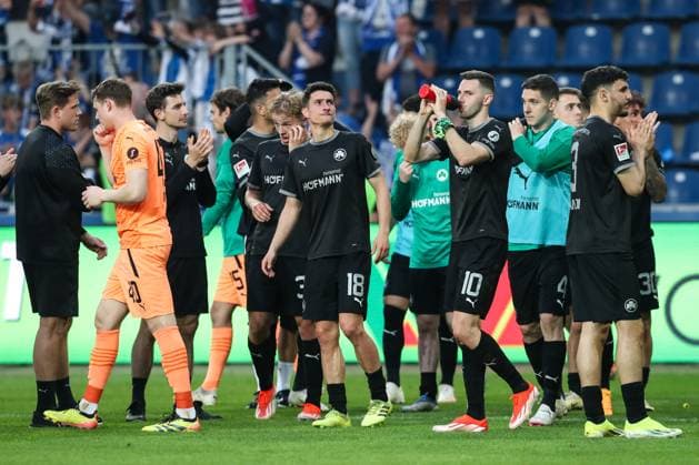 from l Goalkeeper Jonas Urbig SpVgg Greuther Fürth,40 , Marco Meyerhöfer SpVgg Greuther Fürth,18 , Branimir Hrgota SpVgg Greuther Fürth,10 , Damian Michalski SpVgg Greuther Fürth,4 2 Soccer Bundesliga Season 2023 2024 1 FC Magdeburg vs SpVgg Greuther Fürth at the MDCC Arena in Magdeburg Action,Soccer,Man,Men,Germany,10 05 2024