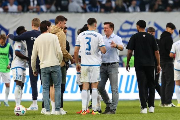 Coach Christian Titz with Andi Hoti 1 FC Magdeburg,3 , Goalkeeper Julian Pollersbeck 1 FC Magdeburg,42 , Jean Hugonet 1 FC Magdeburg,24 2 Soccer Bundesliga Season 2023 2024 1 FC Magdeburg vs SpVgg Greuther Fürth at the MDCC Arena in Magdeburg Soccer,Man,Men,Germany,10 05 2024