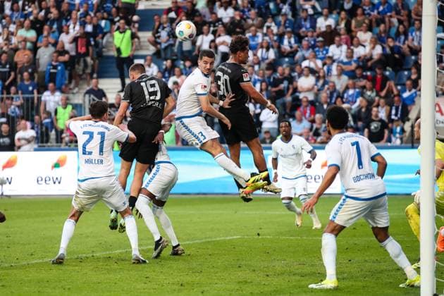Andi Hoti M ,1 FC Magdeburg,3 and Tobias Müller 1 FC Magdeburg,21 vs Leander Popp SpVgg Greuther Fürth,20 and Tim Lemperle SpVgg Greuther Fürth,19 2 Soccer Bundesliga Season 2023 2024 1 FC Magdeburg vs SpVgg Greuther Fürth at the MDCC Arena in Magdeburg Action,Soccer,Man,Men,Germany,10 05 2024