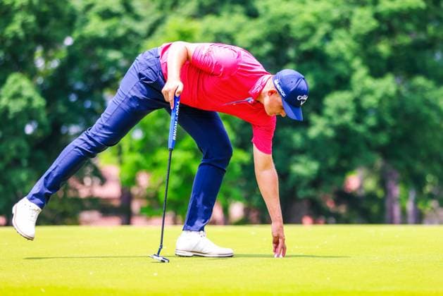 CHARLOTTE, NC - MAY 10: Christiaan Bezuidenhout retrieves his ball on the fourth green during the second round of Wells Fargo Championship at Quail Hollow Club on May 10, 2024 in Charlotte, North Carolina. (Photo by David Jensen Icon Sportswire) GOLF: MAY 10 PGA, Golf Herren Wells Fargo Championship EDITORIAL USE ONLY Icon240510053