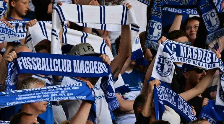 10 05 2024 Soccer Season 2023 2024 2 Soccer Bundesliga 33 Matchday 1 FC Magdeburg FCM SpVgg Greuther Fürth Kleeblatt Sportfoto Zink MeZi xmexzix DFL regulations prohibit any use of photographs as image sequences and or quasi video only for editorial use Fans Fanblock Magdeburg Fanschal Schalparade