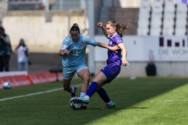SGS Essen vs 1 FC Köln Essen, 11 05 2024 Lilli Purtscheller SGS Essen, 7 in duel with Melina Fabienne Walheim SGS Essen, 30 Google Pixel Womens Bundesliga 21 Matchday SGS Essen vs 1 FC Köln, Stadion an der Hafenstraße on 11 05 2024 DFB DFL REGULATIONS PROHIBIT ANY USE OF PHOTOGRAPHS AS IMAGE SEQUENCES AND OR QUASI VIDEO Copyright: xBEAUTUFULxSports Richterx