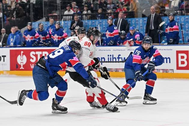PRAGUE, CZECH REPUBLIC MAY 11 Pierre Luc Dubois of Canada battles for the puck against Robert Dowd of Great Britain R during the preliminary round match between Great Britain and Canada at Prague Arena on May 11, 2024 in Prague, Czech Republic Prague Prague Arena Czech Republic Copyright: xJustPictures.ch AndreaxBrancax jp-en-EuSpIm-AB_11052024_AAB_4656