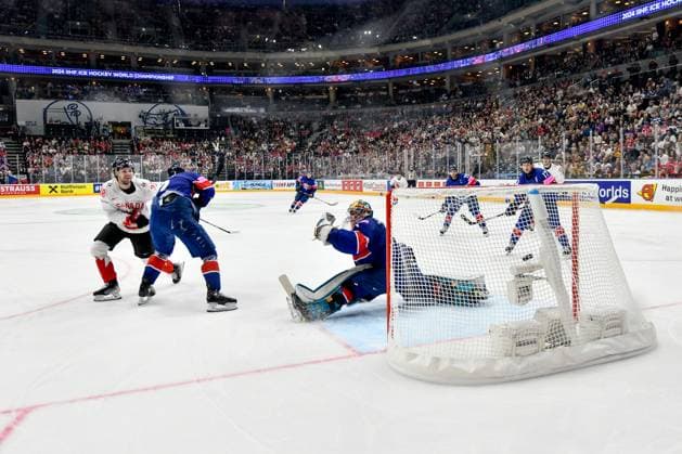 PRAGUE, CZECH REPUBLIC MAY 11 Brandon Hagel of Canada L scores a goal against goalkeeper Jackson Whistle of Great Britain R during the preliminary round match between Great Britain and Canada at Prague Arena on May 11, 2024 in Prague, Czech Republic Prague Prague Arena Czech Republic Copyright: xJustPictures.ch AndreaxBrancax jp-en-EuSpIm-AB_11052024_DSC_7692
