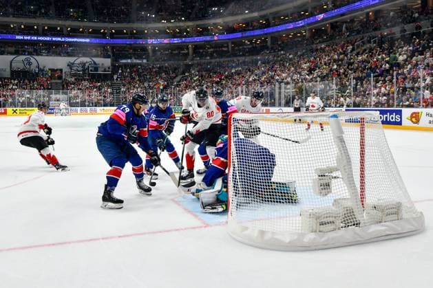 PRAGUE, CZECH REPUBLIC MAY 11 Pierre Luc Dubois of Canada battles for the puck against goalkeeper Jackson Whistle of Great Britain and Nathanael Halbert of Great Britain L during the preliminary round match between Great Britain and Canada at Prague Arena on May 11, 2024 in Prague Prague, Czech Republic Prague Prague Arena Czech Republic Copyright: xJustPictures.ch AndreaxBrancax jp-en-EuSpIm-AB_11052024_DSC_7803