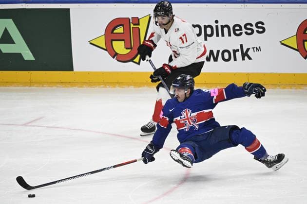 Great Britain vs Canada group A match of the 2024 IIHF World Championship, WM, Weltmeisterschaft in Prague, Czech Republic, on May 11, 2024. From right Jack McBain of Great Britain and Ben Lake of Canada. (CTKxPhoto MichalxKamaryt) CTKPhotoP2024051103110  CTKPhotoP2024051103110