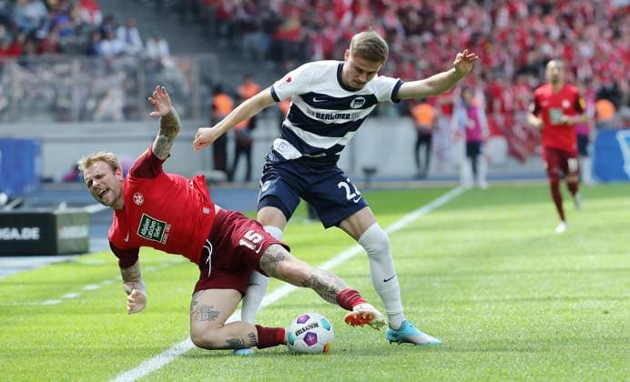 Tymoteusz Puchacz in a duel with Marten Winkler Sport Football Soccer DFL 2 Bundesliga Men 33 Matchday Season 2023 2024 11 05 2024 Hertha BSC Berlin vs 1 FC Kaiserslautern FCK DFL regulations prohibit any use of photographs as image sequences and or quasi video