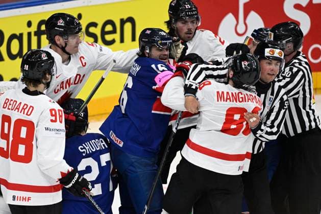 Great Britain vs Canada group A match of the 2024 IIHF World Championship, WM, Weltmeisterschaft in Prague, Czech Republic, on May 11, 2024. From left Sam Duggan of Great Britain and Andrew Mangiapane of Canada. (CTKxPhoto MichalxKamaryt) CTKPhotoP2024051103478  CTKPhotoP2024051103478