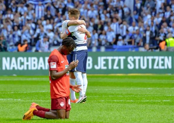 11 05 2024, xlakx, Soccer 2 Bundesliga, Hertha BSC Berlin 1 FC Kaiserslautern emspor, v l Dickson Abiama 1 FC Kaiserslautern 40 disappointed, looks disappointed, dejected, disappointed,Fabian Reese Hertha BSC 11 ,Peter Pekarik Hertha BSC 2 Cheering about the victory, cheering after the match DFL DFB REGULATIONS PROHIBIT ANY USE OF PHOTOGRAPHS as IMAGE SEQUENCES and or QUASI VIDEO Daniel Lakomski Jan Huebner Berlin