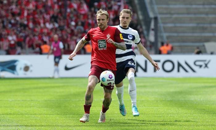 Tymoteusz Puchacz in a duel with Marten Winkler Sport Football Soccer DFL 2 Bundesliga Men 33 Matchday Season 2023 2024 11 05 2024 Hertha BSC Berlin vs 1 FC Kaiserslautern FCK DFL regulations prohibit any use of photographs as image sequences and or quasi video