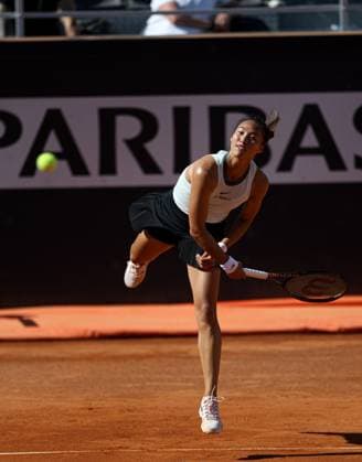 (240512) -- ROME, May 12, 2024 -- Zheng Qinwen of China serves during women s singles round of 32 match against Linda Noskova of the Czech Republic at the WTA, Tennis Damen Italian Open in Rome, Italy, May 11, 2024. ) (SP)ITALY-ROME-TENNIS-WTA-ITALIAN OPEN LixJing 