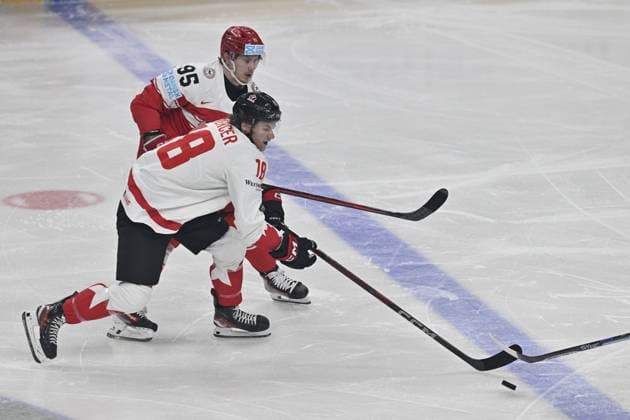 Denmark vs Canada group A match of the 2024 IIHF World Championship, WM, Weltmeisterschaft in Prague, Czech Republic, on May 12, 2024. Nick Olesen (95) of Denmark and Dawson Mercer of Canada. (CTKxPhoto VitxSimanek) CTKPhotoP2024051204131  CTKPhotoP2024051204131