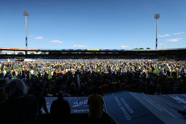 Eintracht Braunschweig fans storm the pitch after the match 2 Soccer Bundesliga season 2023 2024 Eintracht Braunschweig vs SV Wehen Wiesbaden at Eintracht Stadium in Braunschweig Soccer,Man,Men,Germany,12 05 2024