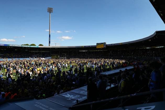 Eintracht Braunschweig fans storm the pitch after the match 2 Soccer Bundesliga season 2023 2024 Eintracht Braunschweig vs SV Wehen Wiesbaden at Eintracht Stadium in Braunschweig Soccer,Man,Men,Germany,12 05 2024