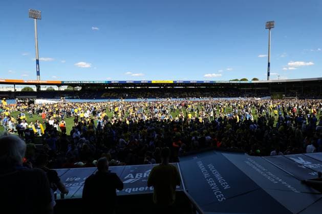 Eintracht Braunschweig fans storm the pitch after the match 2 Soccer Bundesliga season 2023 2024 Eintracht Braunschweig vs SV Wehen Wiesbaden at Eintracht Stadium in Braunschweig Soccer,Man,Men,Germany,12 05 2024