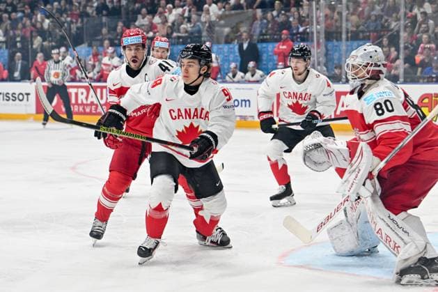PRAGUE, CZECH REPUBLIC MAY 12 Connor Bedard of Canada in action against Jesper Jensen Aabo of Denmark L and goalkeeper Frederik Dichow of Denmark R during the preliminary round match between Denmark and Canada at Prague Arena on May 12, 2024 in Prague, Czech Republic Prague Prague Arena Czech Republic Copyright: xJustPictures.ch AndreaxBrancax jp-en-EuSpIm-AB_12052024_AAB_0204